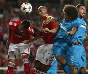 Zenit's Axel Witsel heads the ball to score his goal against Benfica during their Champions League Group C soccer match at Luz stadium in Lisbon