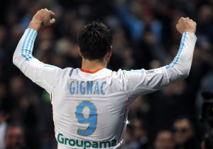 Olympique Marseille's Gignac reacts after scoring against Troyes during their French Ligue 1 soccer match in Marseille