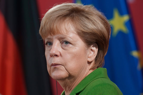 Меркель: Перемирие на Украине нарушают обе стороны конфликта 