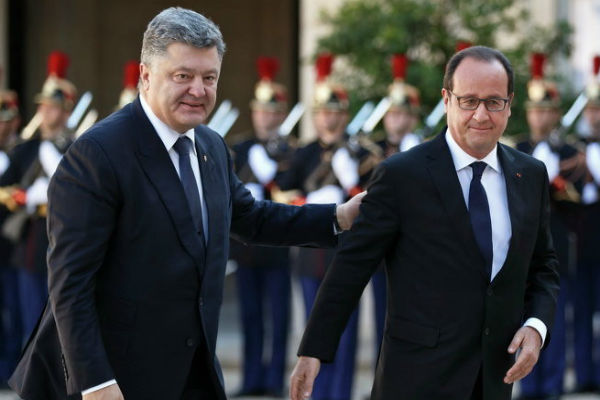 Олланд: Выборы в Донбассе должны быть по украинским законам 