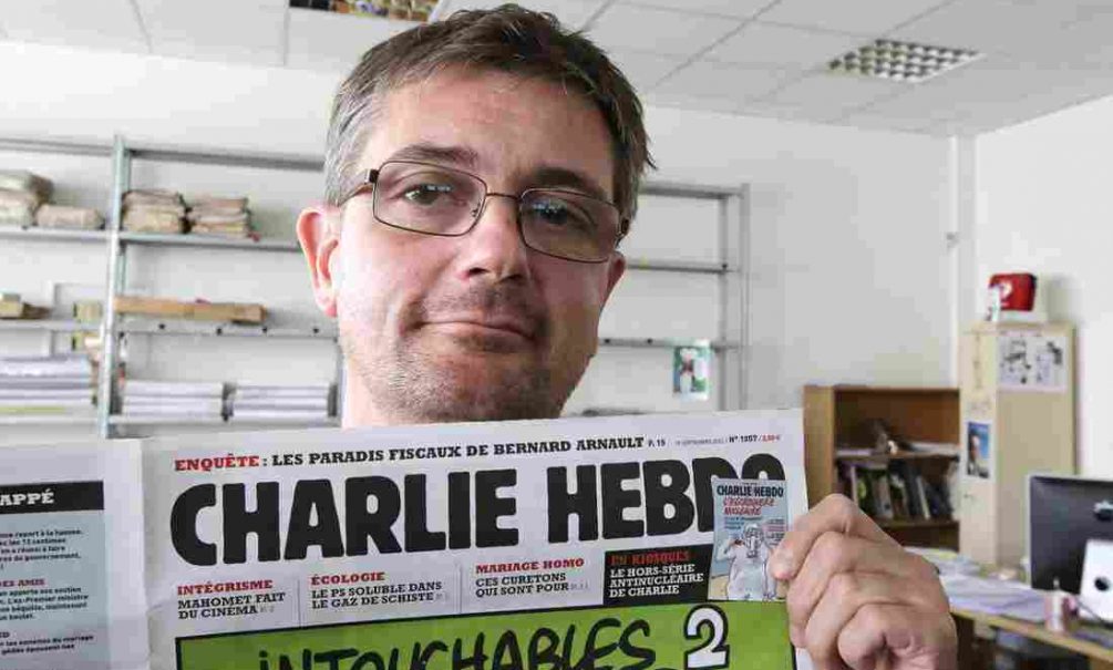 Скандальная редакция Charlie Hebdo осудила теракты в Париже и опубликовала 13 карикатур 