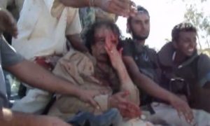 Новое видео казни молившего о пощаде Муаммара Каддафи попало в СМИ