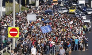 Еврокомиссия пригрозила введением санкций против отказавшихся от беженцев Чехии, Польши и Венгрии