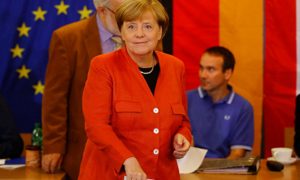 Партия Меркель побеждает на выборах по данным экзит-поллов