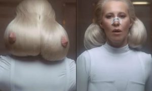 Собчак появилась в клипе Лободы с прической в виде груди