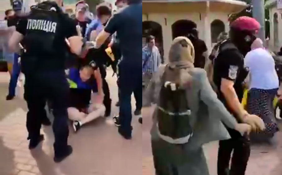 Полицейские в Киево-Печерской лавре набросились на женщин и утащили мужчину за ноги по асфальту 